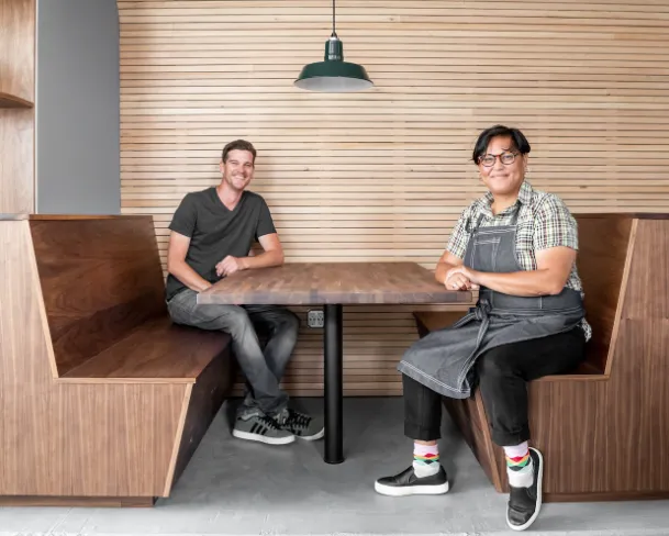Christian and Maricar seated together inside Noe Cafe.